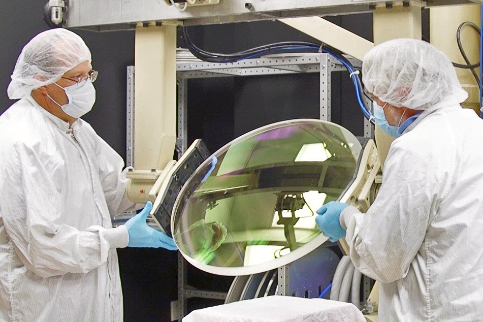 Coating large spherical optic